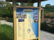 Sign of Indian River Lagoon National Scenic Byway with Playground in Background