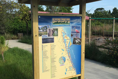 Sign of Indian River Lagoon National Scenic Byway with Playground in Background
